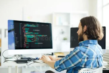 coder-creating-computer-software-serious-pensive-hipster-young-bearded-casual-shirt-working-desktop-modern-office-122547142
